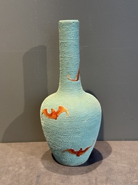 A Chinese iron-red-decorated turquoise-ground bottle vase with bats, Qianlong mark, 20th C.