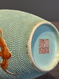 A Chinese iron-red-decorated turquoise-ground bottle vase with bats, Qianlong mark, 20th C.
