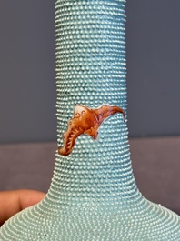 A Chinese iron-red-decorated turquoise-ground bottle vase with bats, Qianlong mark, 20th C.