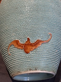 A Chinese iron-red-decorated turquoise-ground bottle vase with bats, Qianlong mark, 20th C.