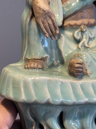 A Chinese Longquan celadon Guanyin, Ming or later