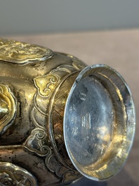 A Chinese parcel-gilt silver wine ewer for the Peranakan or Straits market,  Xuan Huang Hao 炫煌號 and An Yi Zao 安益造 mark, 19/20th C.