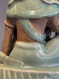 A Chinese Longquan celadon Guanyin, Ming or later