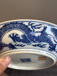 An imperial Chinese blue and white 'dragon' plate, Qianlong mark and of the period