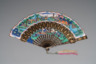 Two Chinese Canton gilt-lacquered and painted paper fans, one with original box, 19th C.