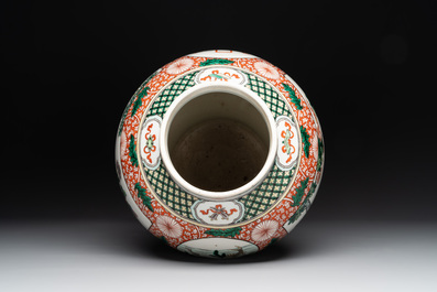 A Chinese famille verte 'mythical animal' vase and two Canton famille rose vases, 19th C.