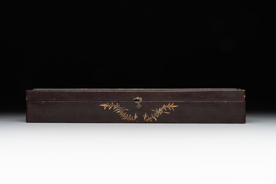 Two Chinese Canton gilt-lacquered and painted paper fans, one with original box, 19th C.