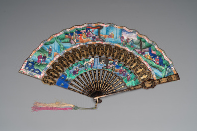Two Chinese Canton gilt-lacquered and painted paper fans, one with original box, 19th C.