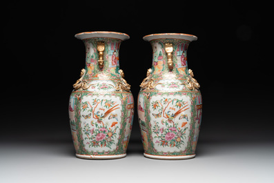 A Chinese famille verte 'mythical animal' vase and two Canton famille rose vases, 19th C.