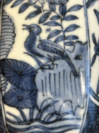 A Chinese blue and white 'kraak' porcelain betel box and cover with a bird on a rock, Wanli