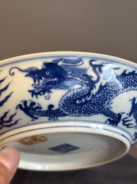 An imperial Chinese blue and white 'dragon' plate, Qianlong mark and of the period
