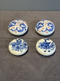 A pair of Chinese blue and white and a pair of blue, white and copper-red seal paste boxes, Kangxi and Qianlong mark, 19th C.