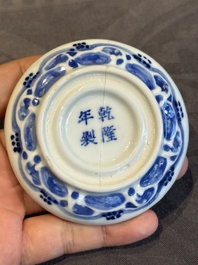 A pair of Chinese blue and white and a pair of blue, white and copper-red seal paste boxes, Kangxi and Qianlong mark, 19th C.