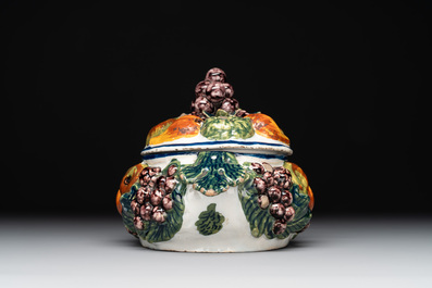 A polychrome Dutch Delft butter tub in the shape of various fruits, 18th C.
