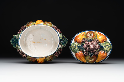 A polychrome Dutch Delft butter tub in the shape of various fruits, 18th C.