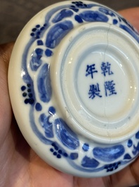 A pair of Chinese blue and white and a pair of blue, white and copper-red seal paste boxes, Kangxi and Qianlong mark, 19th C.