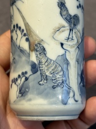 A large Chinese blue, white and copper-red 'zodiac' snuff bottle, squirrel mark, 19th C.
