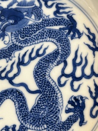 An imperial Chinese blue and white 'dragon' plate, Qianlong mark and of the period