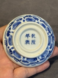 A pair of Chinese blue and white and a pair of blue, white and copper-red seal paste boxes, Kangxi and Qianlong mark, 19th C.
