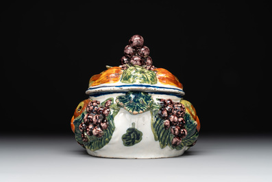 A polychrome Dutch Delft butter tub in the shape of various fruits, 18th C.