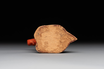 A Chinese carved red coral 'mythical animals' snuff bottle on stand, 19/20th C.