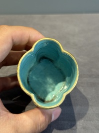 A small Chinese famille rose turquoise-ground brush pot, Qianlong mark, 19th C.