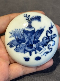 A pair of Chinese blue and white and a pair of blue, white and copper-red seal paste boxes, Kangxi and Qianlong mark, 19th C.