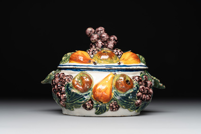 A polychrome Dutch Delft butter tub in the shape of various fruits, 18th C.