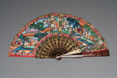 Two Chinese Canton gilt-lacquered and painted paper fans, one with original box, 19th C.