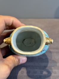 A Chinese famille rose puce-enamelled turquoise-ground 'hu' vase, Republic
