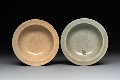 A Chinese Longquan celadon stem cup and two saucers, Ming