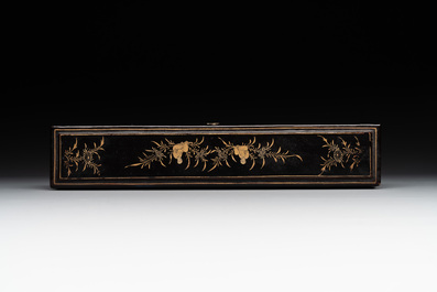 A Chinese Canton gilt-lacquered and painted paper fan and a framed relief painting, 19th C.