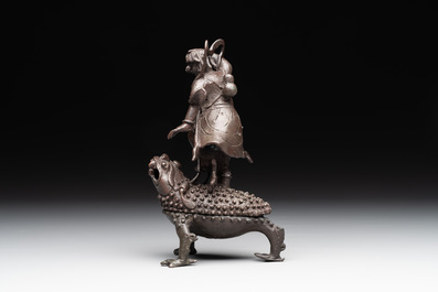 A rare Chinese bronze incense burner and cover in the shape of Liu Hai and a three legged toad, Ming