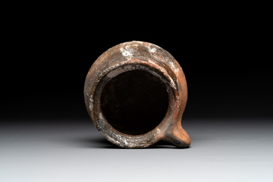 Five pieces of glazed earthenware cooking utensils and a fire bell, probably The Netherlands, 17th C.