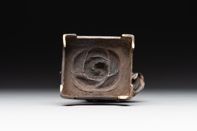 A fine Chinese bronze Luohan holding a sutra, Ming