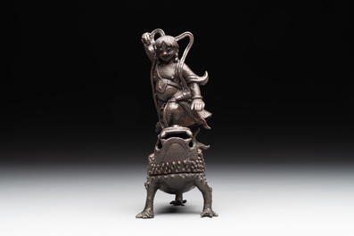 A rare Chinese bronze incense burner and cover in the shape of Liu Hai and a three legged toad, Ming