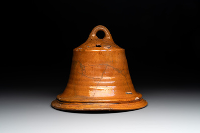 Five pieces of glazed earthenware cooking utensils and a fire bell, probably The Netherlands, 17th C.