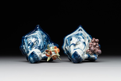 A pair of polychrome Dutch Delft groups of merchant ladies, 18th C.