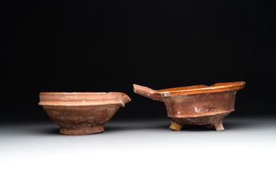 Five pieces of glazed earthenware cooking utensils and a fire bell, probably The Netherlands, 17th C.