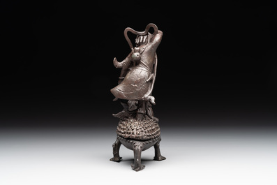 A rare Chinese bronze incense burner and cover in the shape of Liu Hai and a three legged toad, Ming