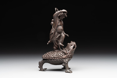A rare Chinese bronze incense burner and cover in the shape of Liu Hai and a three legged toad, Ming