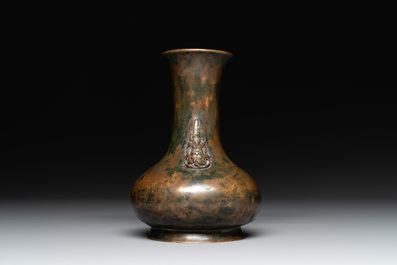 A small Chinese bronze bottle vase with lion-form handles, Qing, 17th C.