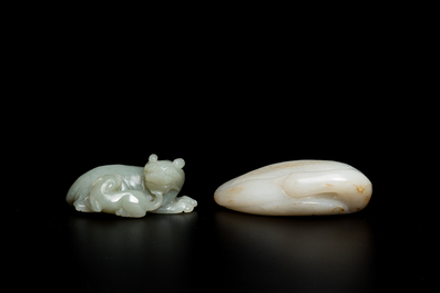 A Chinese celadon jade carving of a lion with cub and a white jade carving of a goose, Qing