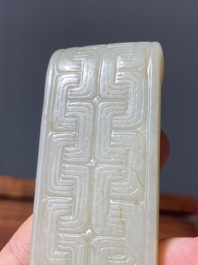 Two fine Chinese white and celadon jade brush rests, Qing
