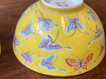 A pair of Chinese famille rose yellow-ground 'butterfly' bowls, Tongzhi mark, 20th C.