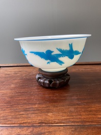 A Chinese blue-overlay white Beijing glass 'meiping' vase, a bowl and a bottle, 19/20th C.