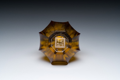 A Chinese facetted translucent amber-coloured Peking glass bottle vase, Qianlong mark, 19th C.