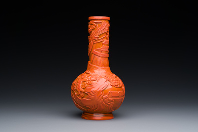 A Chinese coral-red Peking glass bottle vase, Daoguang mark and probably of the period