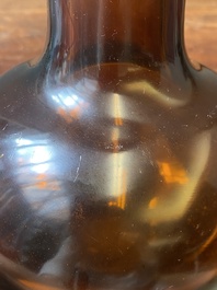 A rare Chinese translucent amber-coloured Peking glass bottle vase, Qianlong mark and of the period