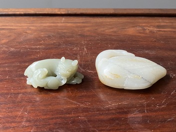 A Chinese celadon jade carving of a lion with cub and a white jade carving of a goose, Qing